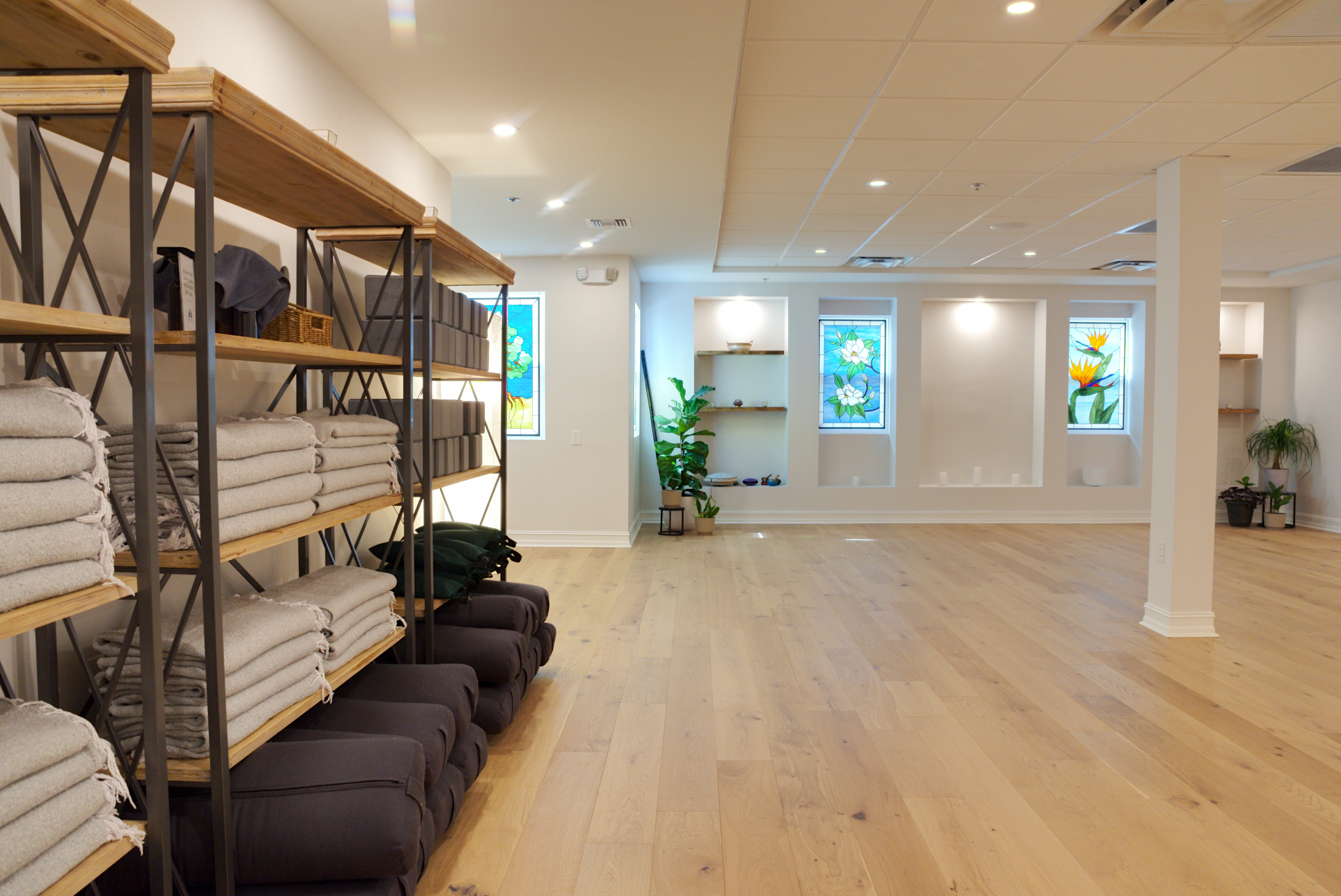 Magnolia Yoga and Wellness Center class practicing mindful movement in a calm studio space